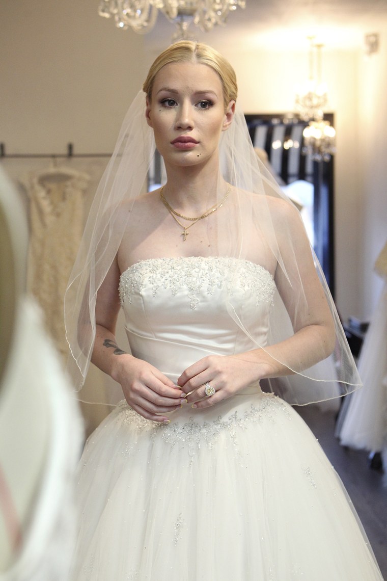 Iggy Azalea and James Cordon in wedding dresses