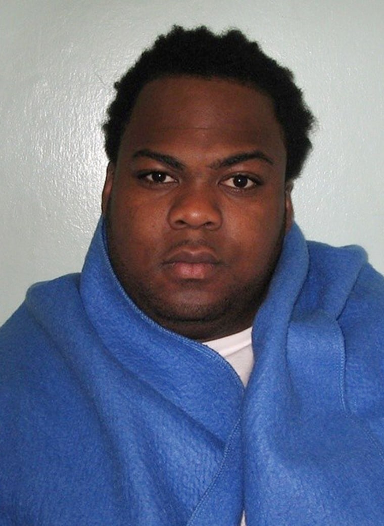 Image: A Metropolitan Police handout photo shows the custody photograph of Nicholas Salvador after his arrest in London.