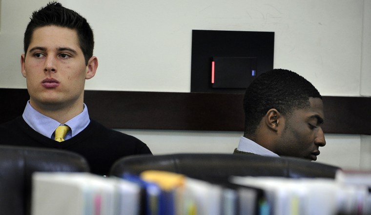 Brandon Vandenburg and Corey Batey wait for court to start during day six of the Vanderbilt rape trial on Monday, Jan. 19, 2015, in Nashville in Tenn.