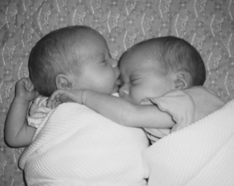 Mom Traci Whittington Craft writes on Facebook, "My sweet fraternal twins are now 9 years old and even now when they sleep together, I will find them asleep as they are in this picture from when we brought them home from the hospital. I'm beyond blessed to have been selected to be a mommy of twins. They bless me each and every day."