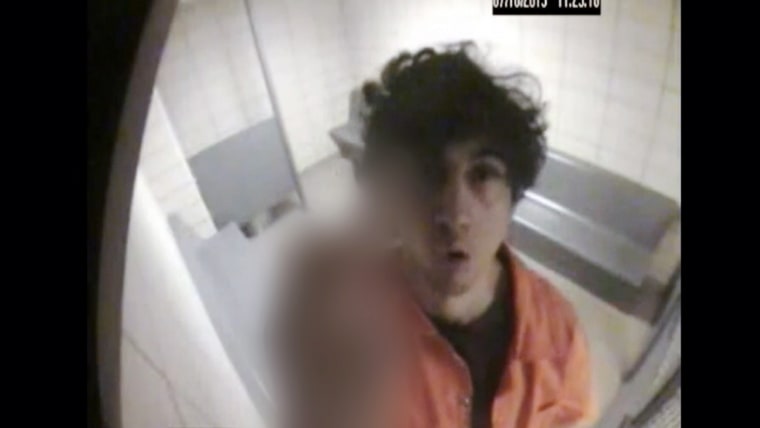 Image: Video recorded in a jail cell in 2013 a few months after the bombing shows Dzhokhar Tsarnaev flashing his middle finger to the camera.