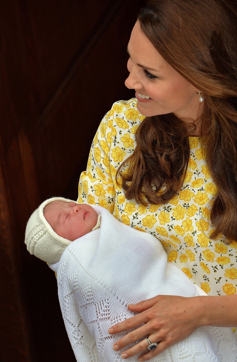 Image: Britain's Catherine, Duchess of Cambridge holds her newly-born daughter