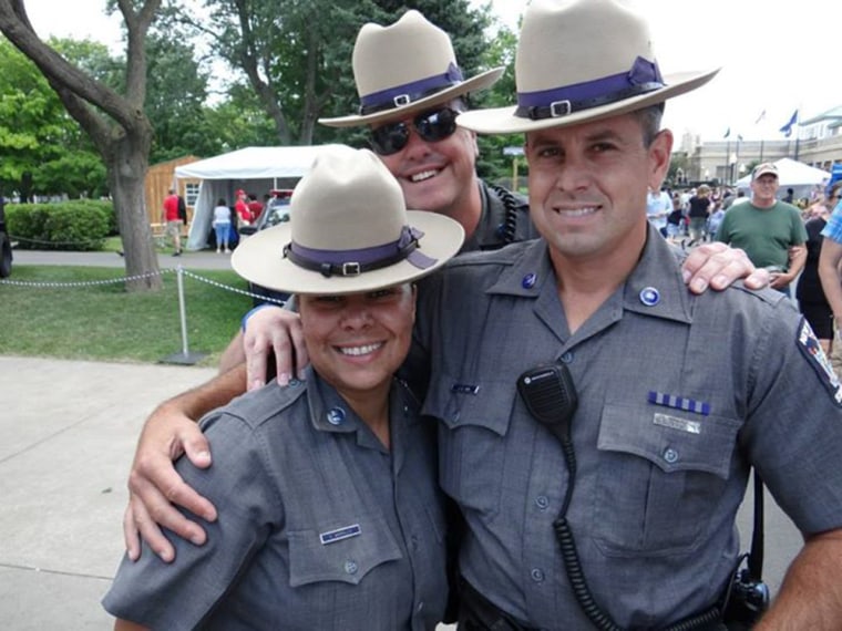 Image: Xaymara Morales, Jon Giddings and Sgt. Jay Cook