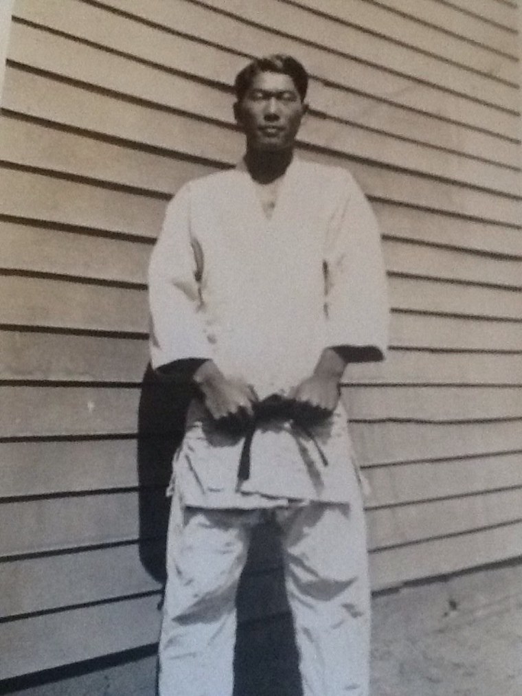 Nancy Oda's father poses in his judo outfit.