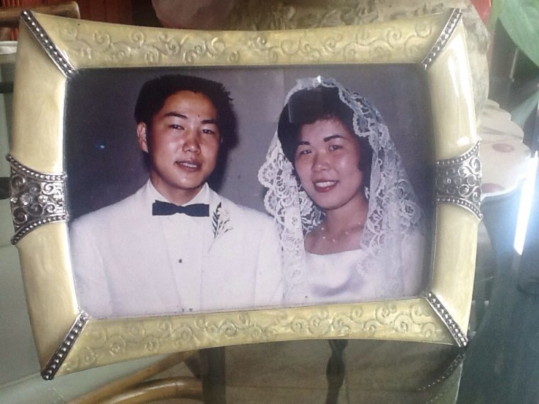 Nancy Oda and her high school sweetheart who became her husband, on their wedding day.