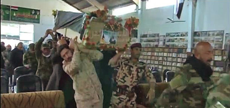 In this video released by the Badr Organization, a fallen militia fighter is brought into a mausoleum in Iraq. Iranian media identified the fighter as an Iranian national and member of the country’s Revolutionary Guard Corps.