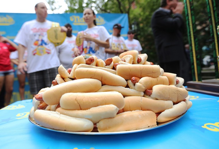 Image: Hot dogs sit on a plate during the Nathan's Famous Fourth of July International Hot Dog Eating Contest