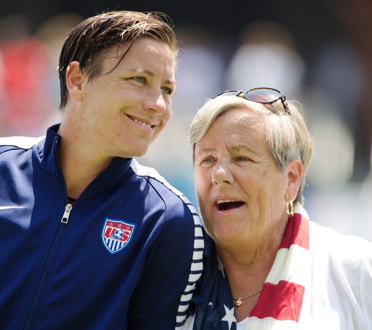 Image: Abby Wambach of the United States smiles with her mom, Judy Wambach