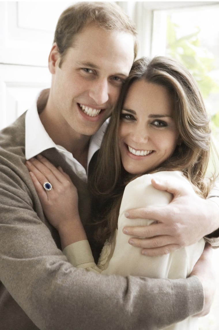 Britain's Prince William and Middleton pose in their official engagement portraits, taken by photographer Mario Testino in London