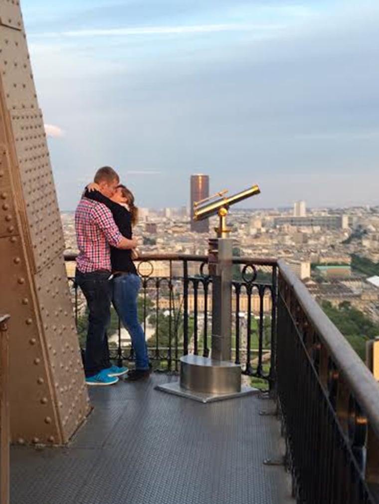 unnamed couple get engaged on Eiffel Tower.