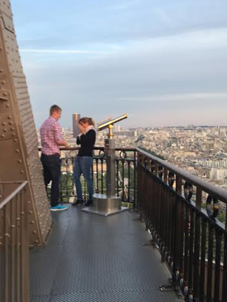 unnamed couple get engaged on Eiffel Tower.