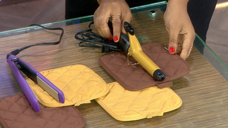Wrap a curling iron or straightener in a pot holder