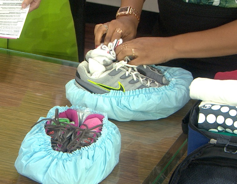 Use an old shower cap to keep your shoes from dirtying up your other clothes