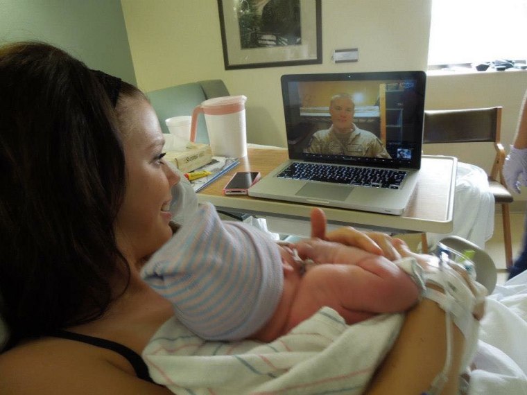 Ted Freese meets his newborn son, Carson, over Skype.