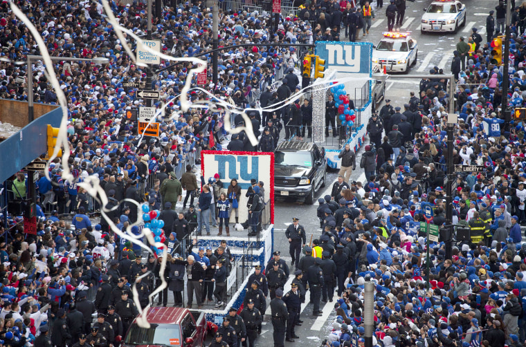The New York Giants motorcade of floats make their way during the team's NFL football Super Bowl parade in New York, Tuesday, Feb. 7, 2012. The Giants returned from their Super Bowl win to a celebration the likes that only New York can throw: a ticker-tape parade in the Canyon of Heroes on Broadway, where the city has honored stars for almost a century.