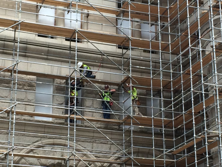 Crews work on the Trump International Hotel, located at the site of the Old Post Office Pavilion in Washington D.C.