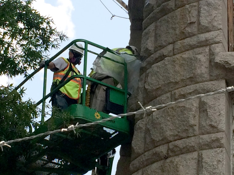 Crews work on the Trump International Hotel, located at the site of the Old Post Office Pavilion in Washington D.C.