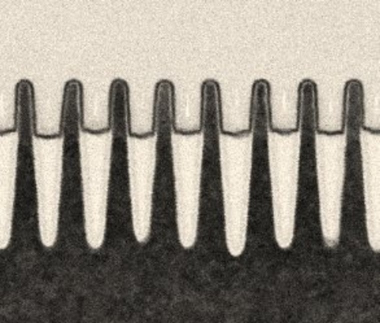 The 7-nanometer transistors themselves (the squared-off pieces inside the "fins").