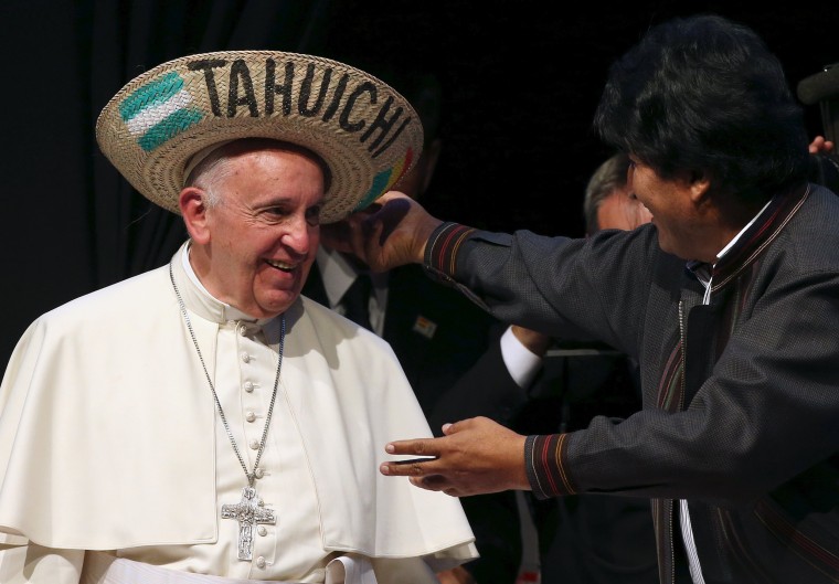 Image: Pope Francis receives a typical sombrero from Morales during a World Meeting of Popular Movements in Santa Cruz
