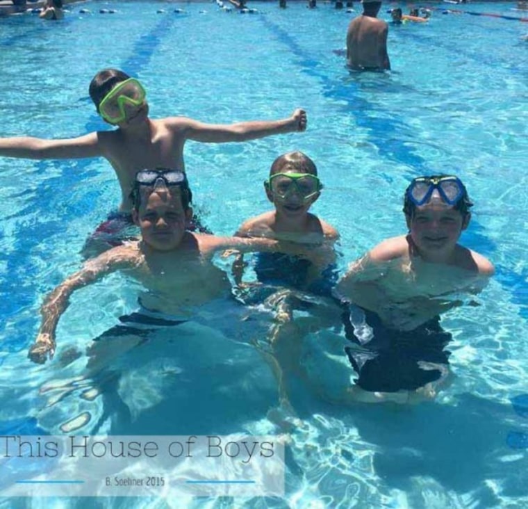 Boys swimming in a pool