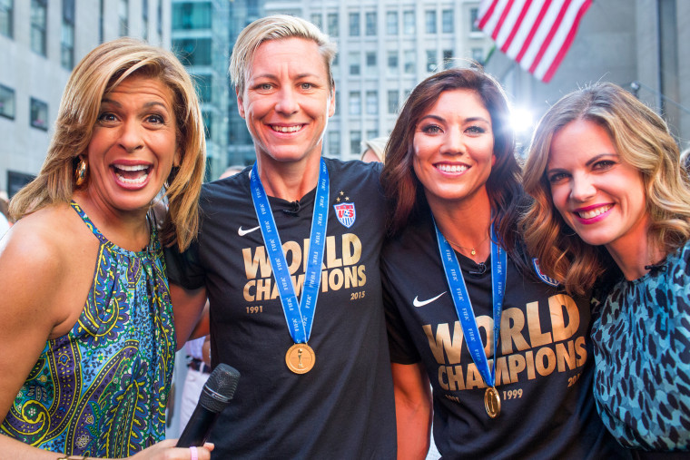 Abby Wamach and Hope Solo of the U.S. Women's National Soccer Team on the plaza before the Ticker-Tape parade
