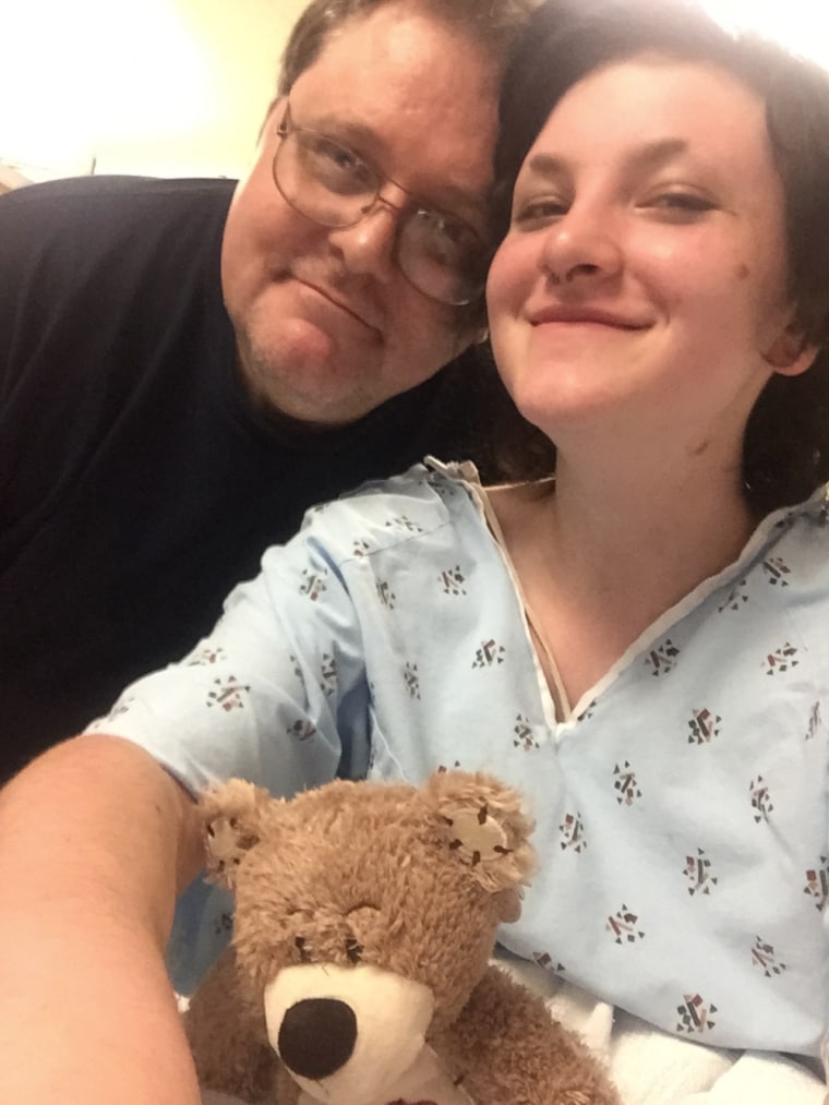 Autumn Veatch recovers in the hospital with her father.