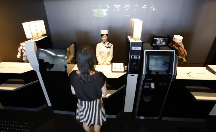 Image: Receptionist robot greets a hotel employee