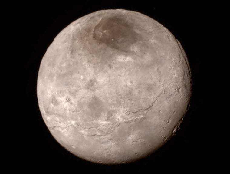 Remarkable new details of Pluto’s largest moon, Charon, are revealed in this image from New Horizons’ Long Range Reconnaissance Imager, taken late on July 13 from a distance of 289,000 miles (466,000 kilometers).