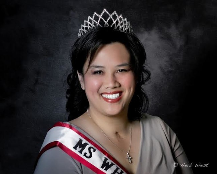 Image: Theresa de Vera poses for a head shot after being crowned Ms. Wheelchair.