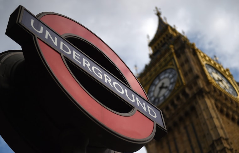 Image: A London Underground sign outside Westminster Station in London