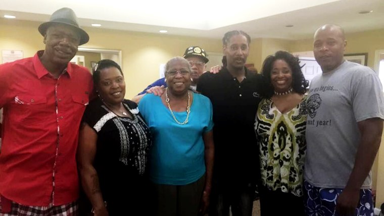 Robert Allen Jr. and siblings Stacey, Sonya, AJ and David, with adoptive mother Eloise Allen and uncle (on his mother's side) Donald