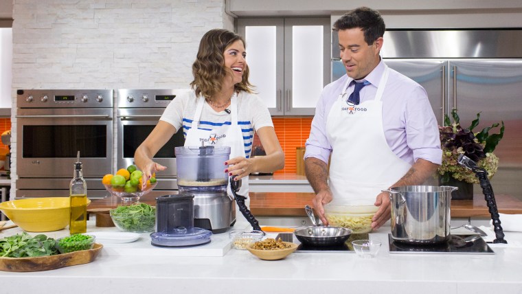 Siri and Carson Daly looking good in their TODAY Food aprons