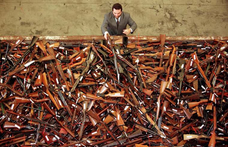 Image: A pile of about 4,500 prohibited firearms 