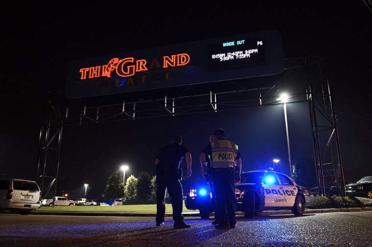 Image: Lafayette police stand outside of the Grand Theatre on Thursday