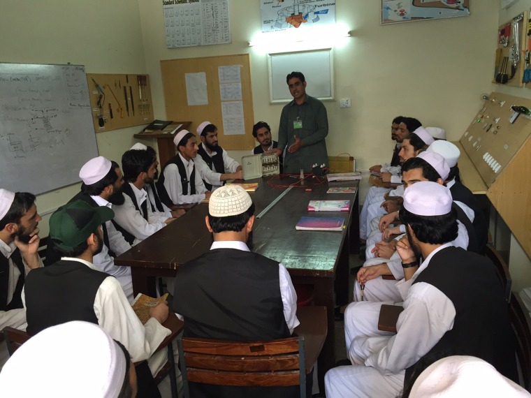 Image: Former Taliban fighters attend a physics class