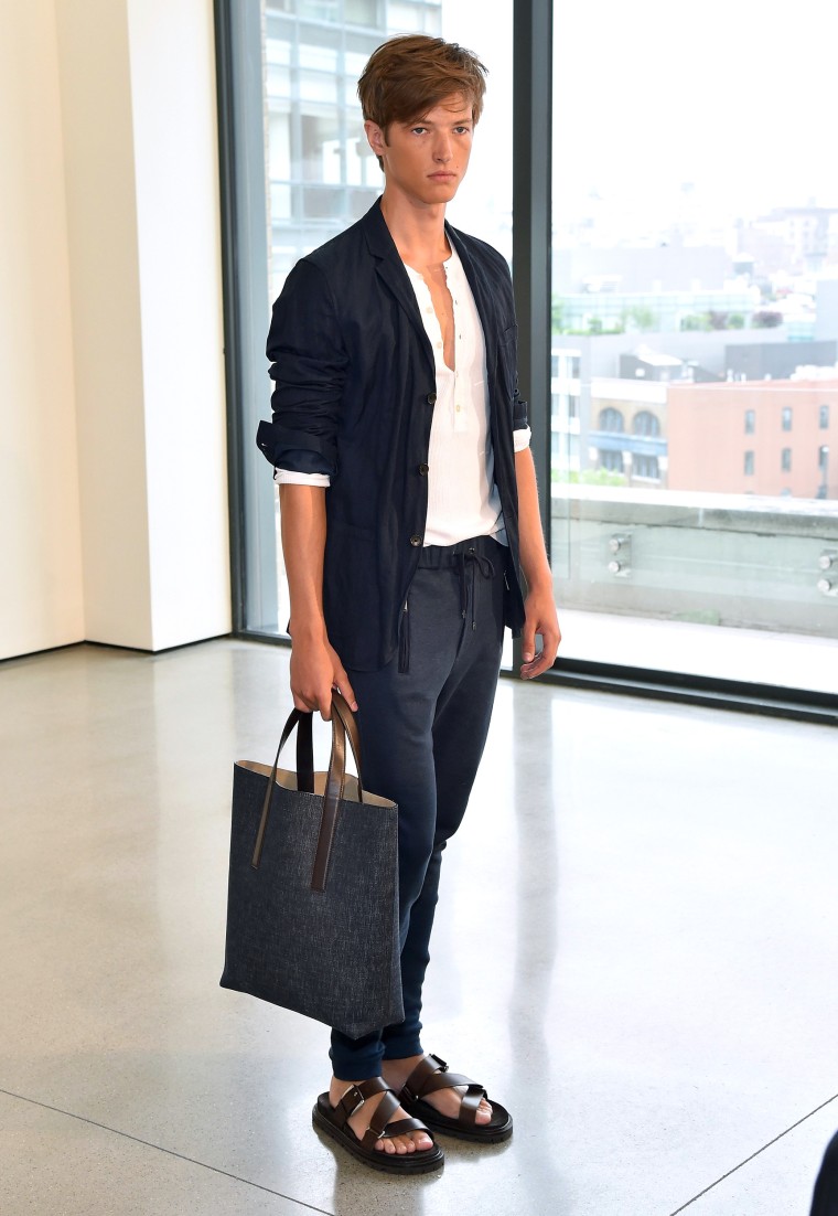 Navy business casual sweater, pants - A model walks at the Michael Kors Spring 2016 Presentation during New York Fashion Week: Men's