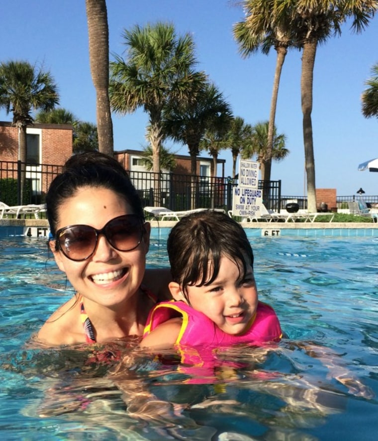 Mom and daughter in pool