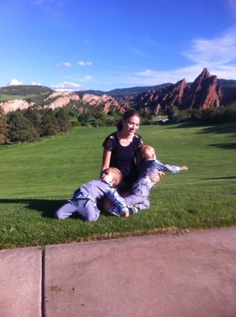 Mom with kids in grass