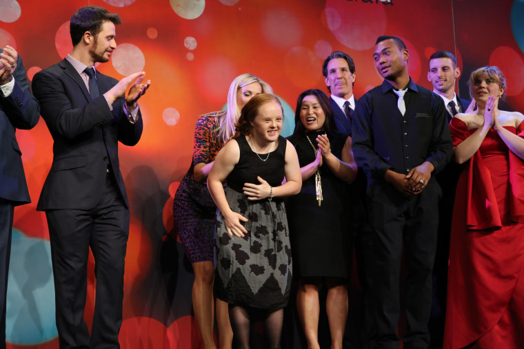 Special Olympics athlete Tess Trojan is welcomed on stage at the 2014 iteration of LIMITLESS: The Special Olympics Canada Gala