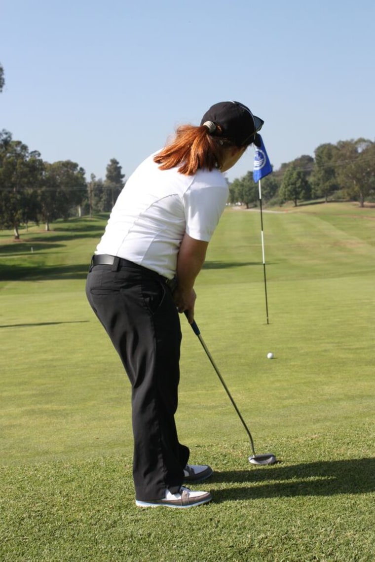 Special Olympics athlete Tess Trojan putts at the 2015 World Games golf training camp in Los Angeles, California
