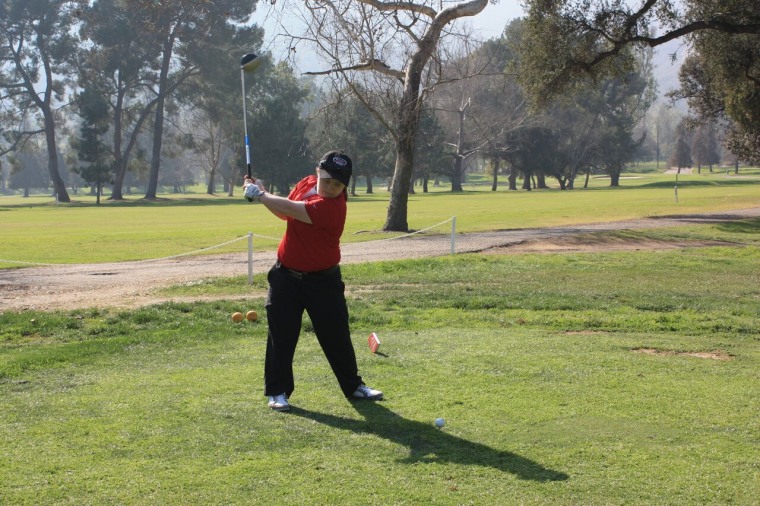 Special Olympics athlete Tess Trojan perfecting her form at the 2015 World Games golf training camp in Los Angeles, California