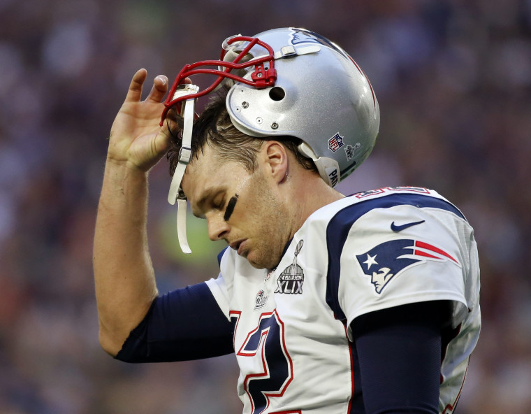 Image: File photo of New England Patriots quarterback Tom Brady walking to the sidelines after throwing an interception in the first quarter against the Seattle Seahawks during the NFL Super Bowl XLIX football game in Glendale