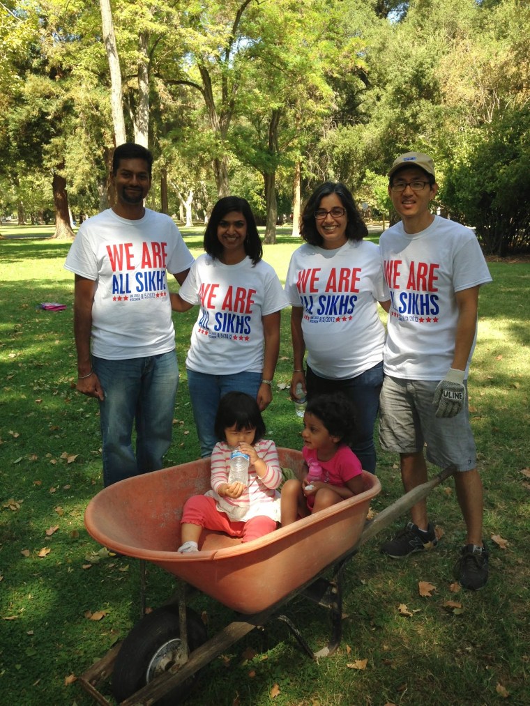 Image: Sevadaars, partnered with Sacramento South Asian Bar Association and Land Park Volunteer Corps, cleaned up William Land Park for the 2014 National Day of Seva.