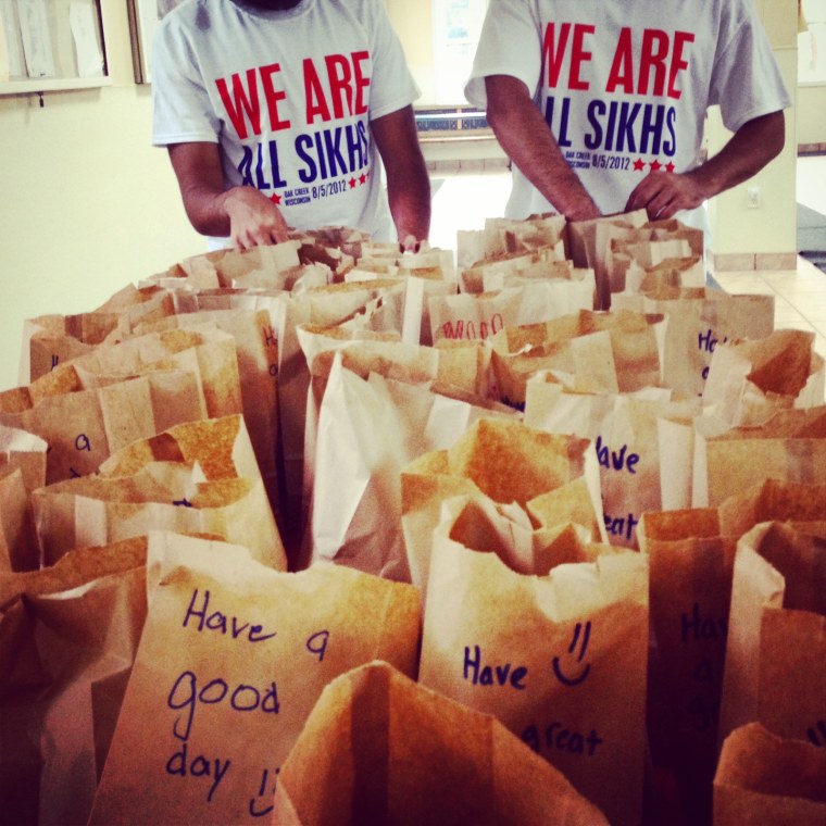 Image: Houston sevadaars packed meals for the homeless for the 2014 National Day of Seva.