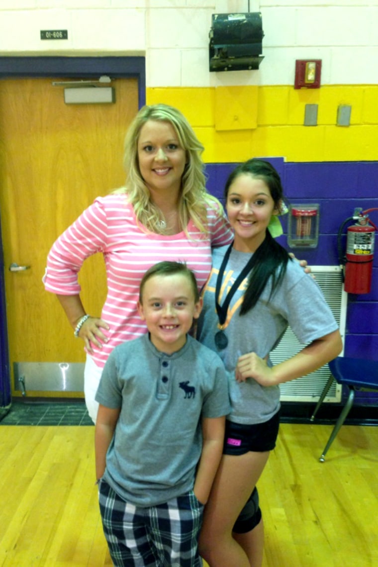Image: Amber Taylor with her children Lindsey and Trace
