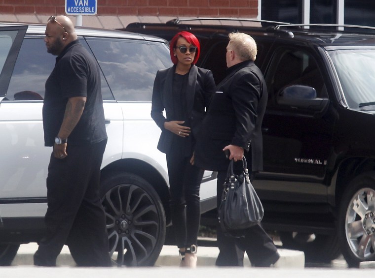 Image: Singer Monica, arrives for the funeral of Kristina Bobbi Brown, the only child of singer Whitney Houston, at Saint James United Methodist Church in Alpharetta