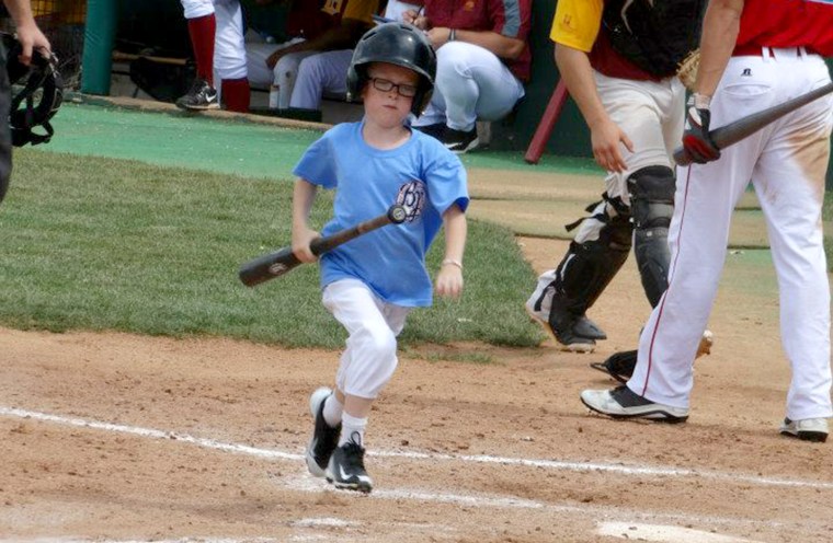 Kaiser Carlile, a 9-year-old bat boy was in critical condition after getting hit in the head with a bat by a baseball player taking practice swings in Kansas, his team said.