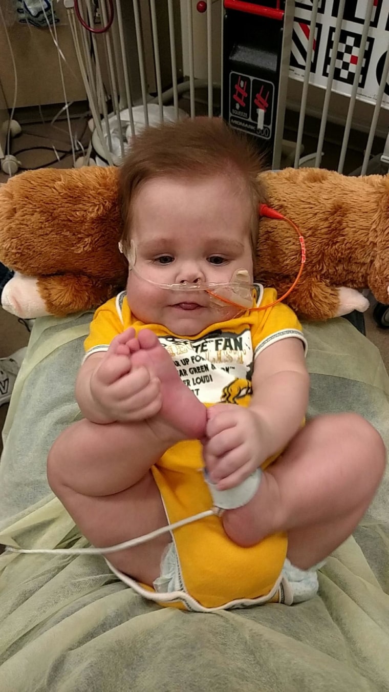 Trevor "smiles and he babbles… he is an interactive smart little guy," his nurses say.