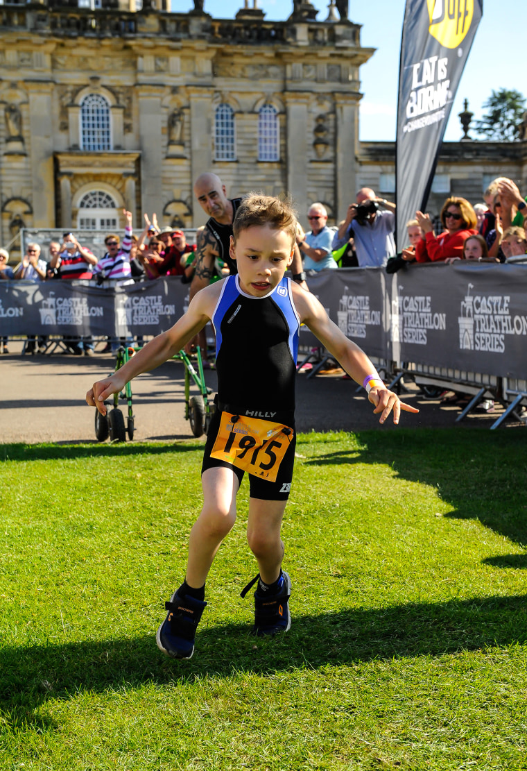 Bailey Matthews, 8-year-old with cerebral palsy finishes a triathalon