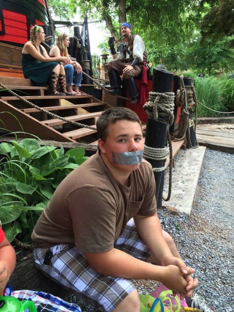 Teen with duct tape over mouth